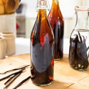 Large bottle filled with homemade vanilla extract.