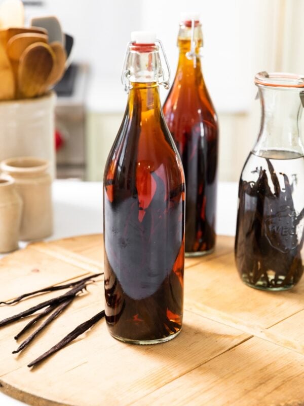 Large bottle filled with homemade vanilla extract.