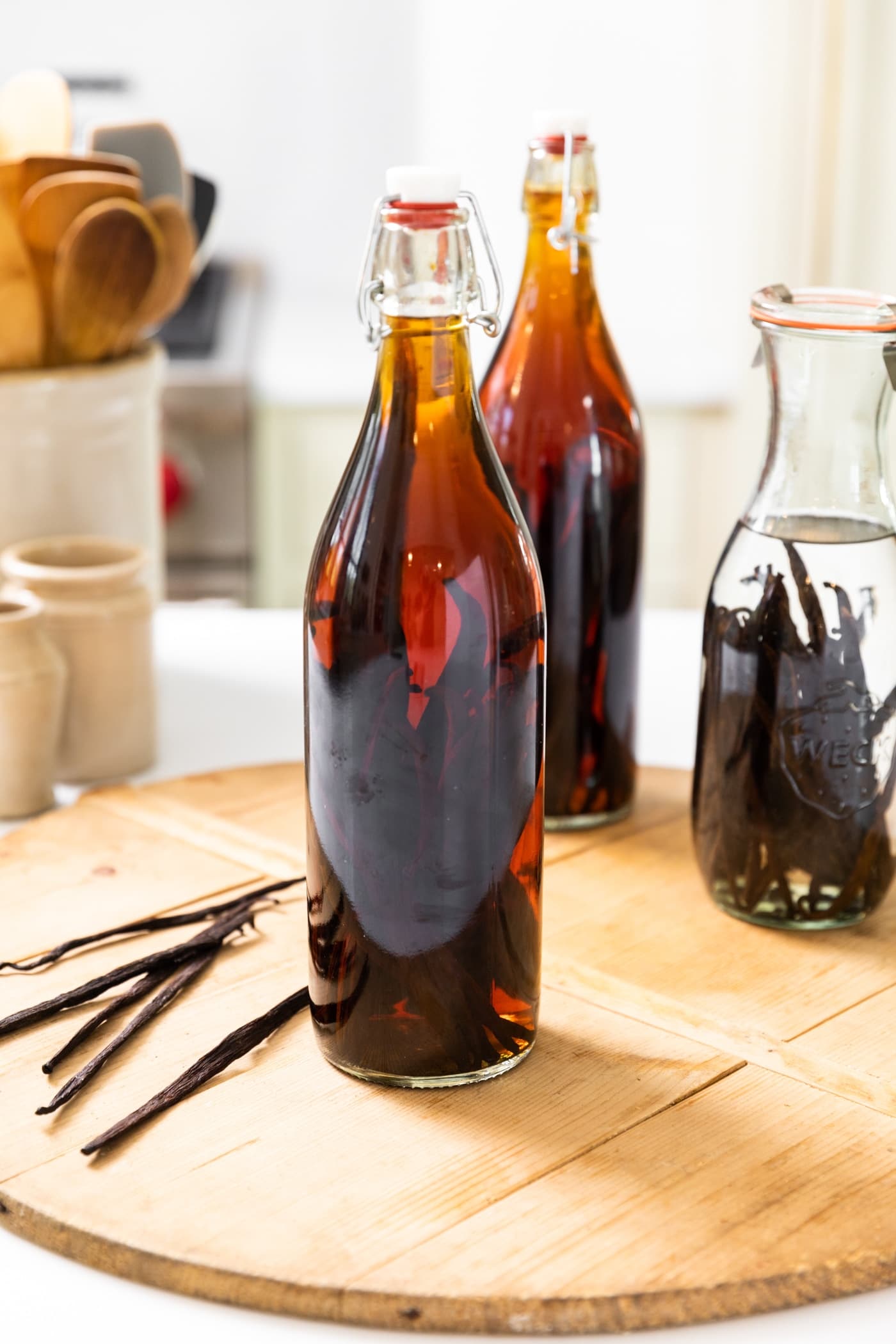 Large bottle filled with homemade vanilla extract.