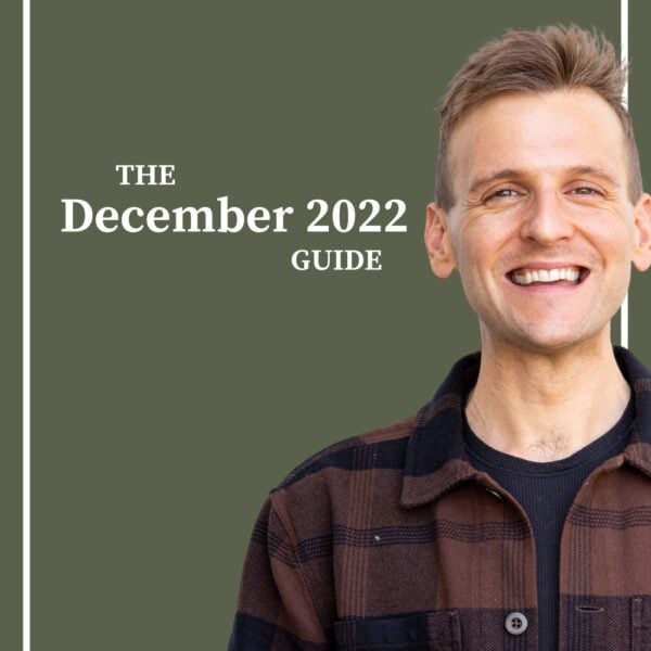 Kaleb Wyse wearing brown and black plaid shirt standing in front of dark green background with the words "The December 2022 Guide".