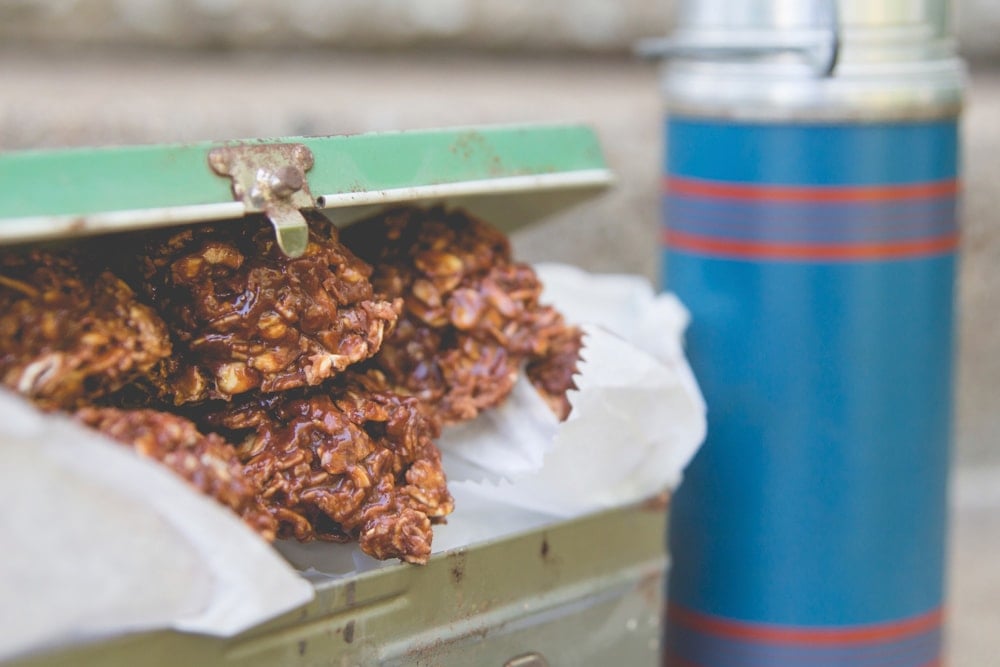 No-bake cookies poke out of an ajar lunch box.