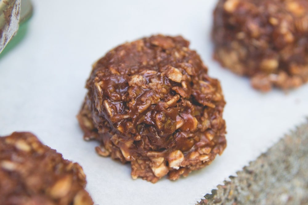 A no-bake cookies sits on parchment paper.