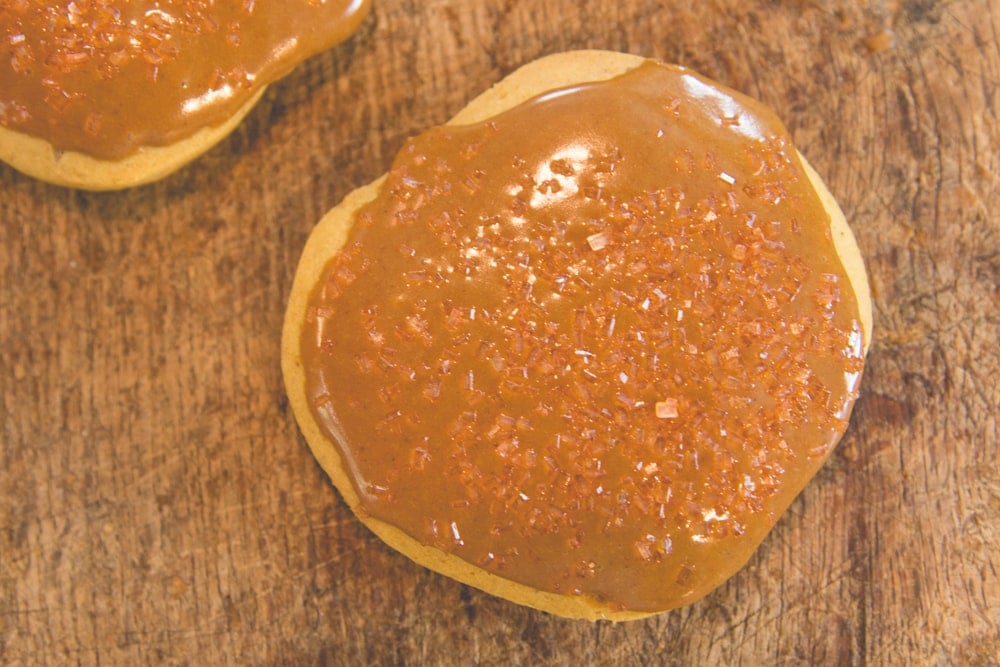 A cookie with glaze on top.