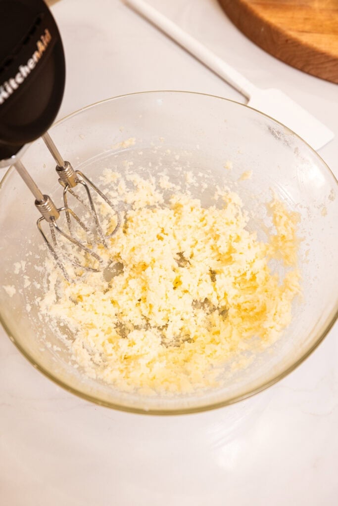 Aerated butter and sugar in a bowl after being beaten.