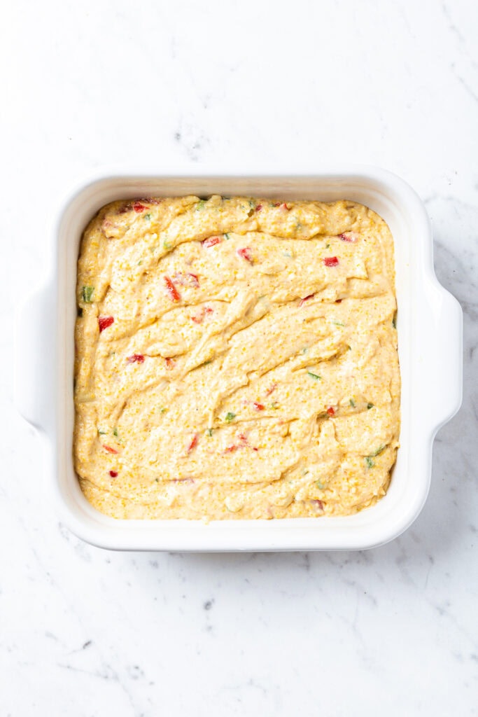 Batter for brown butter jalapeno cornbread in a dish prior to baking.
