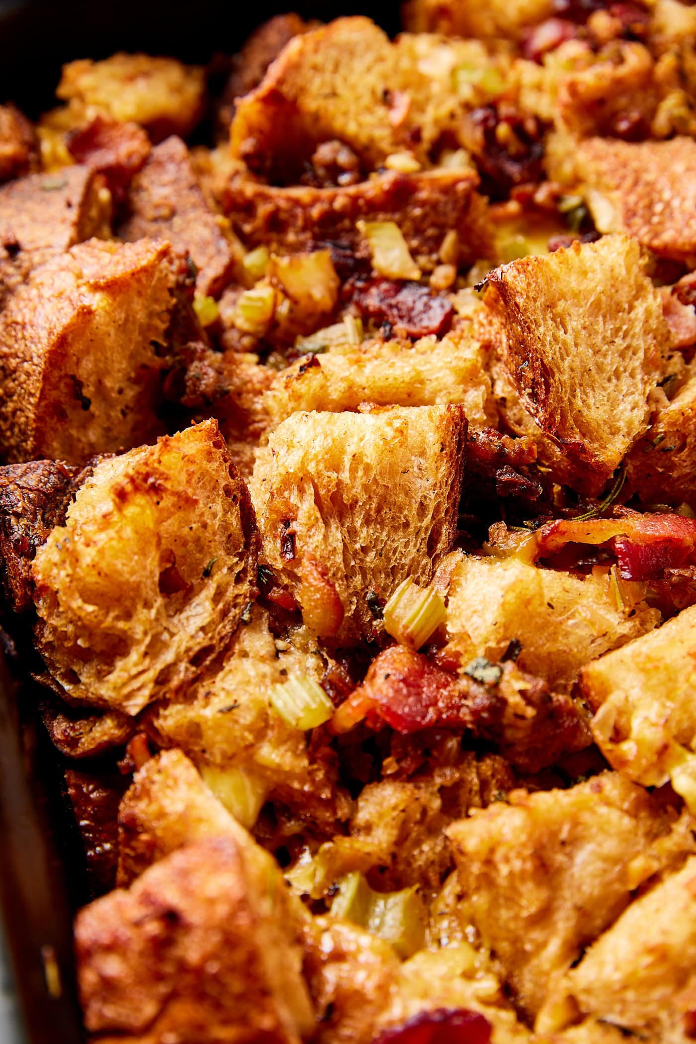 Cubes of bread in a baking dish forming a Thanksgiving stuffing.