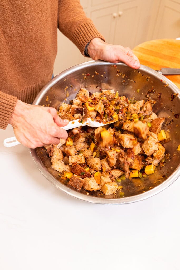 Mixing stuffing ingredients together.