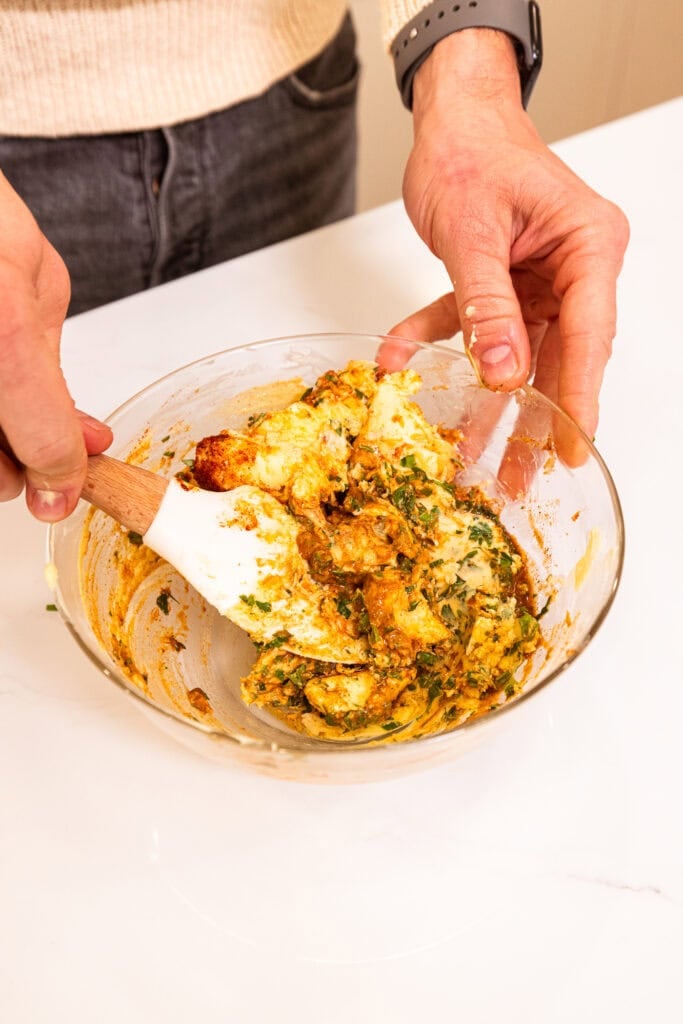 Mixing together ingredients to form a compound cowboy butter.