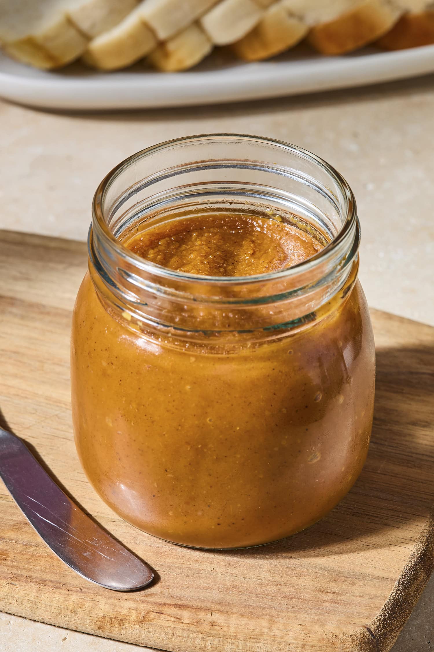 Pumpkin butter in a glass jar after being prepared.