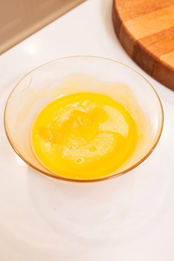 Solidified browned butter in a bowl after cooling.