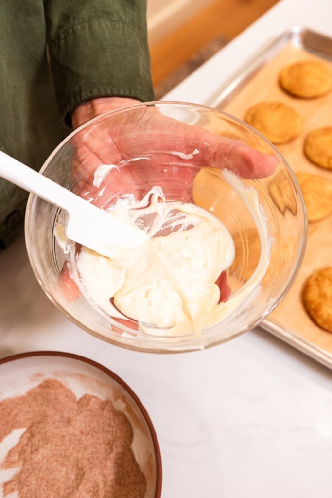 Melted white chocolate in a bowl.