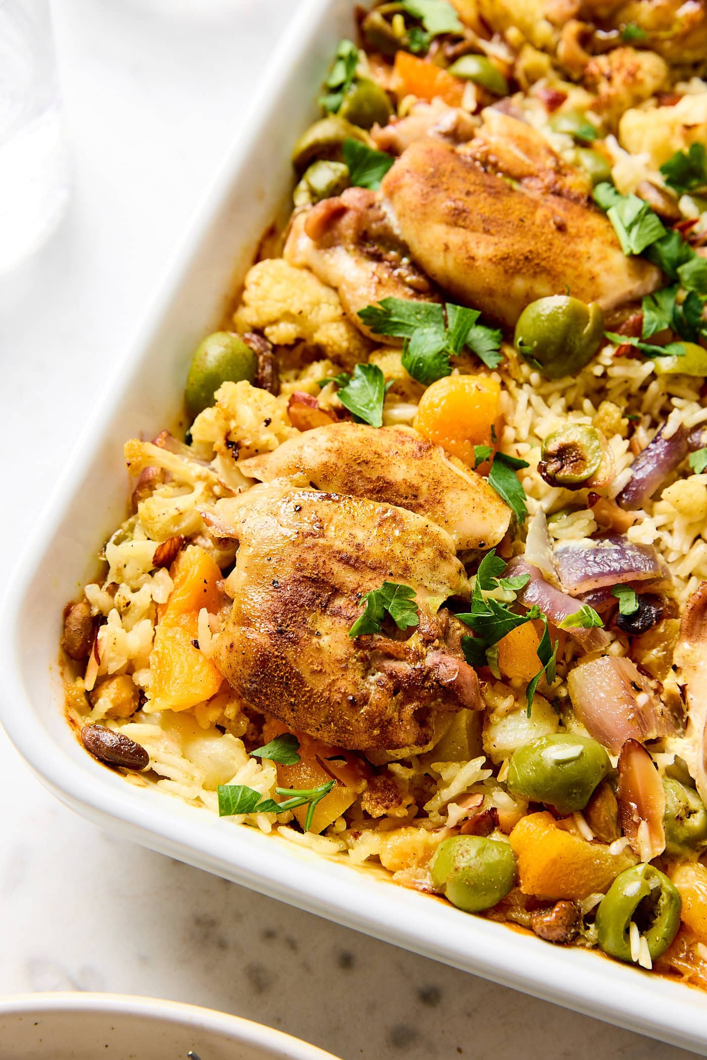 Fresh parsley sprinkled over chicken rice pilaf.