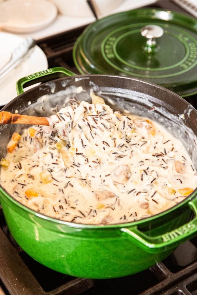 Chicken and wild rice soup warms over heat.