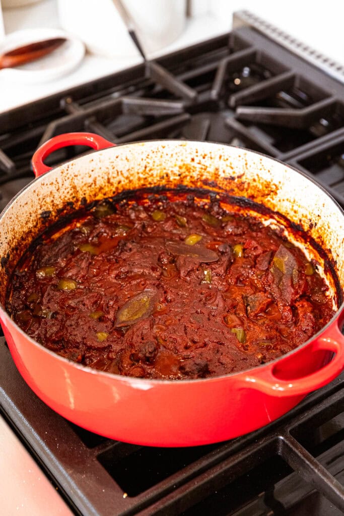 Cooked chili on a stove.