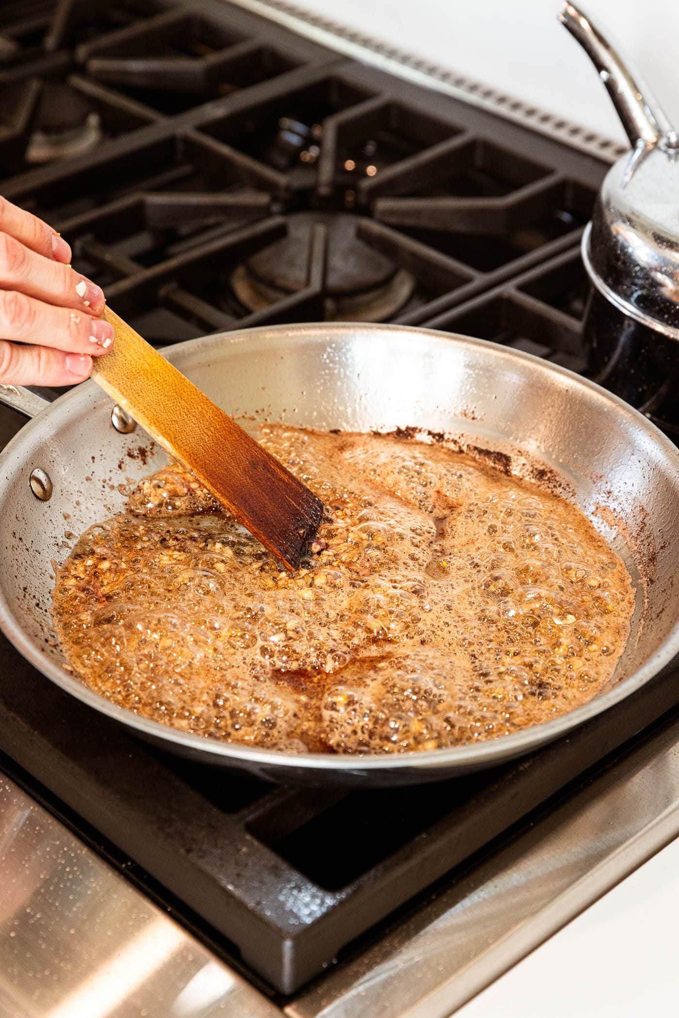 Garlic and shallot cooking with stock.