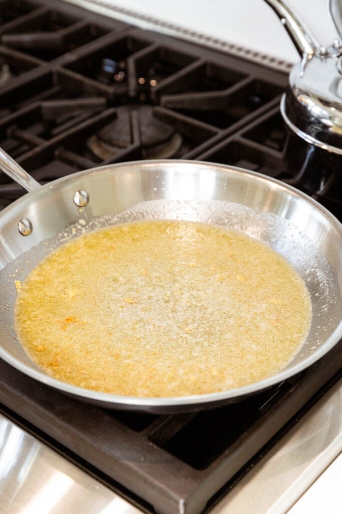 Melted butter sauce in a pan.