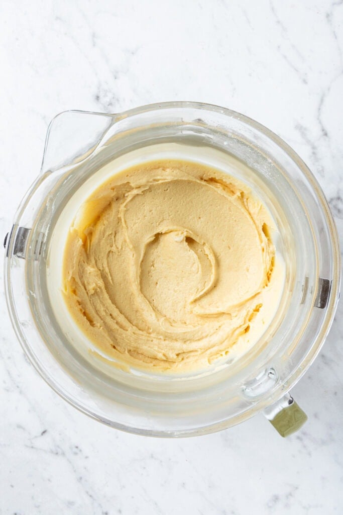 White cake batter after being mixed.