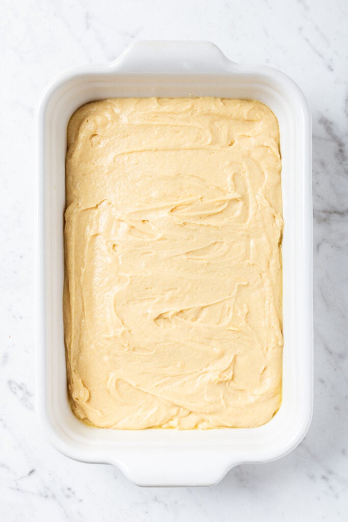 Cake batter in a dish.