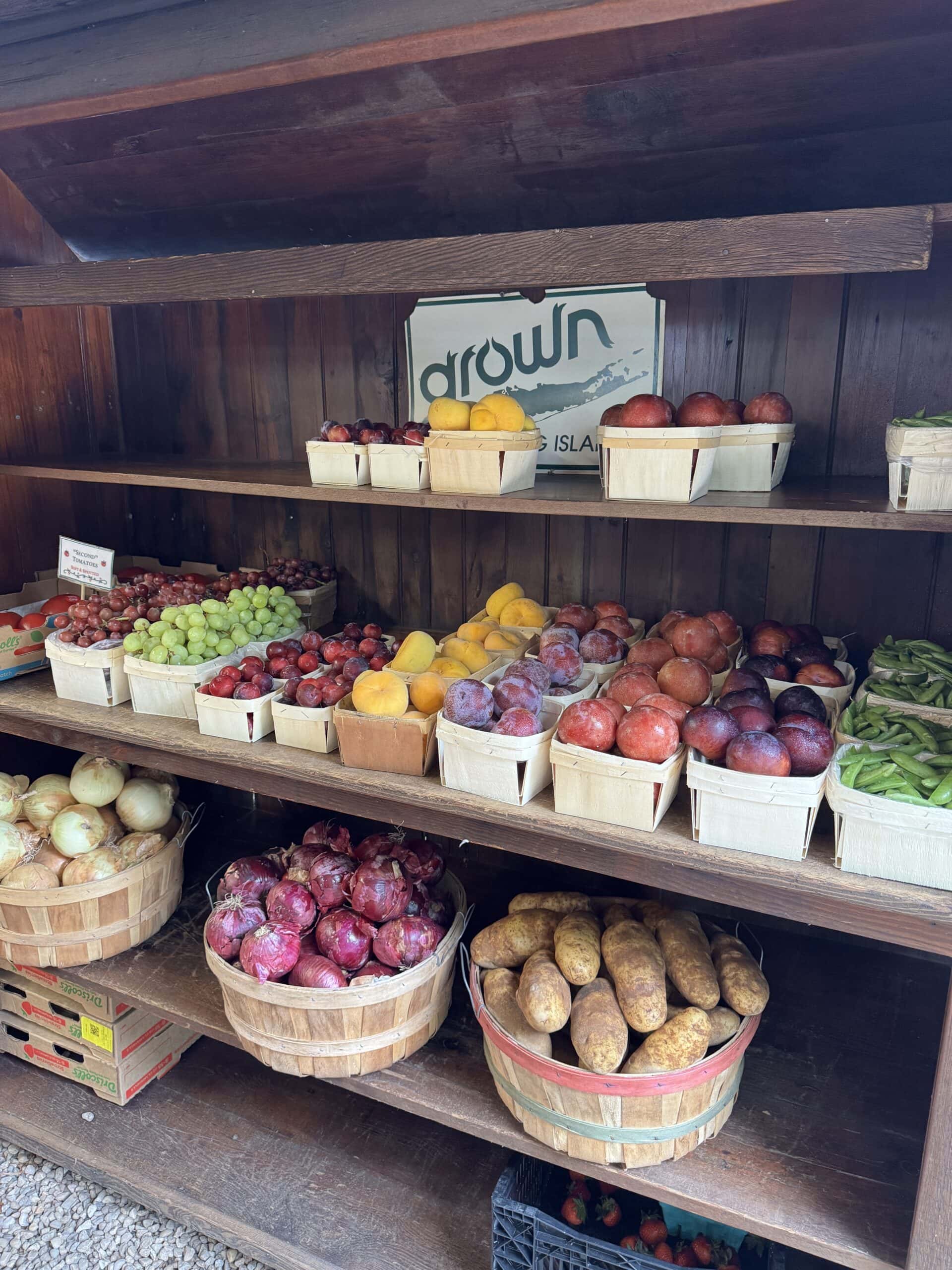 Lots of produce at a farmstand.