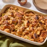 Baked croissant stuffing in a white baking dish ready for the holidays.