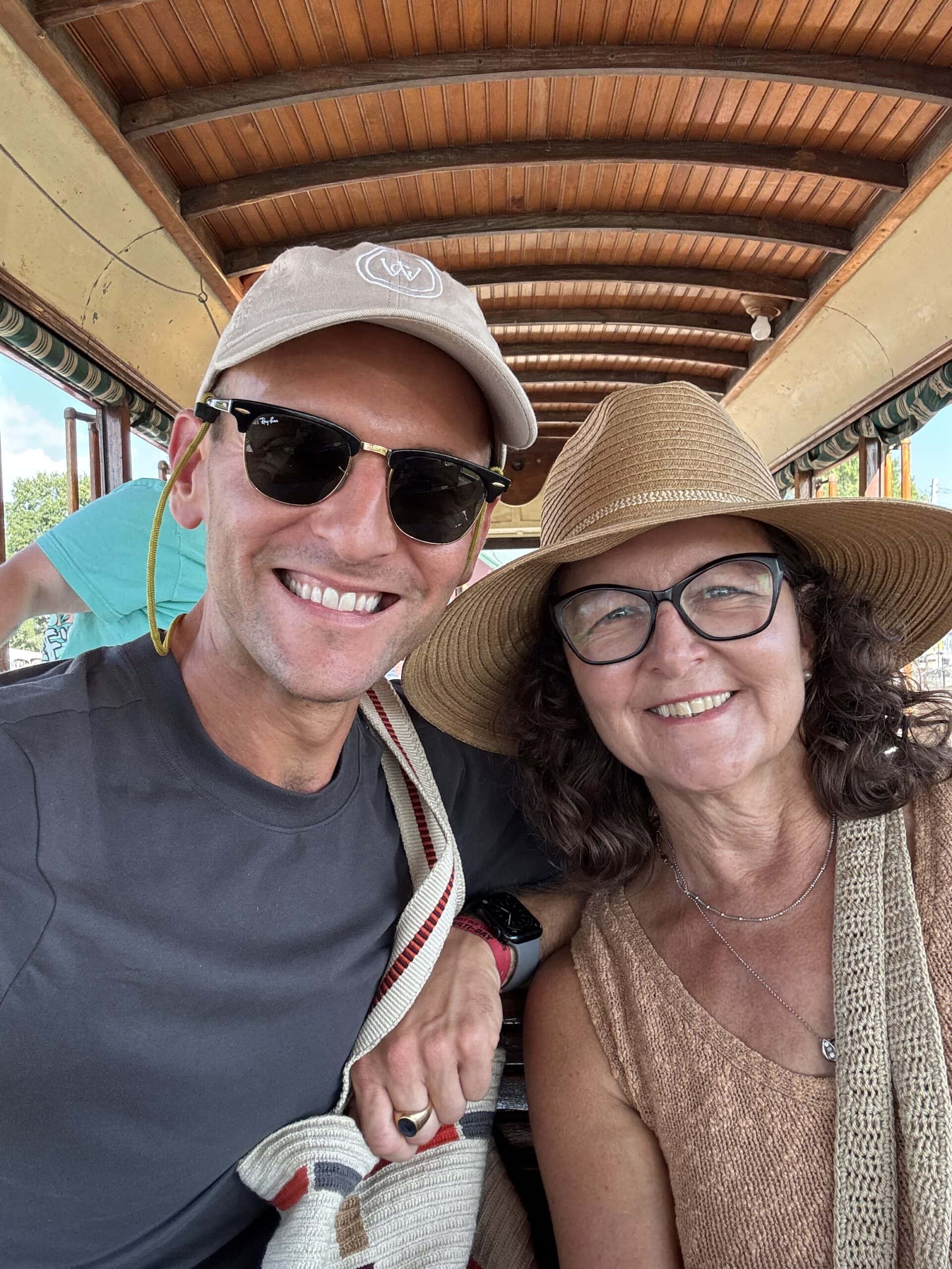 Kaleb with his mom on a trolley.