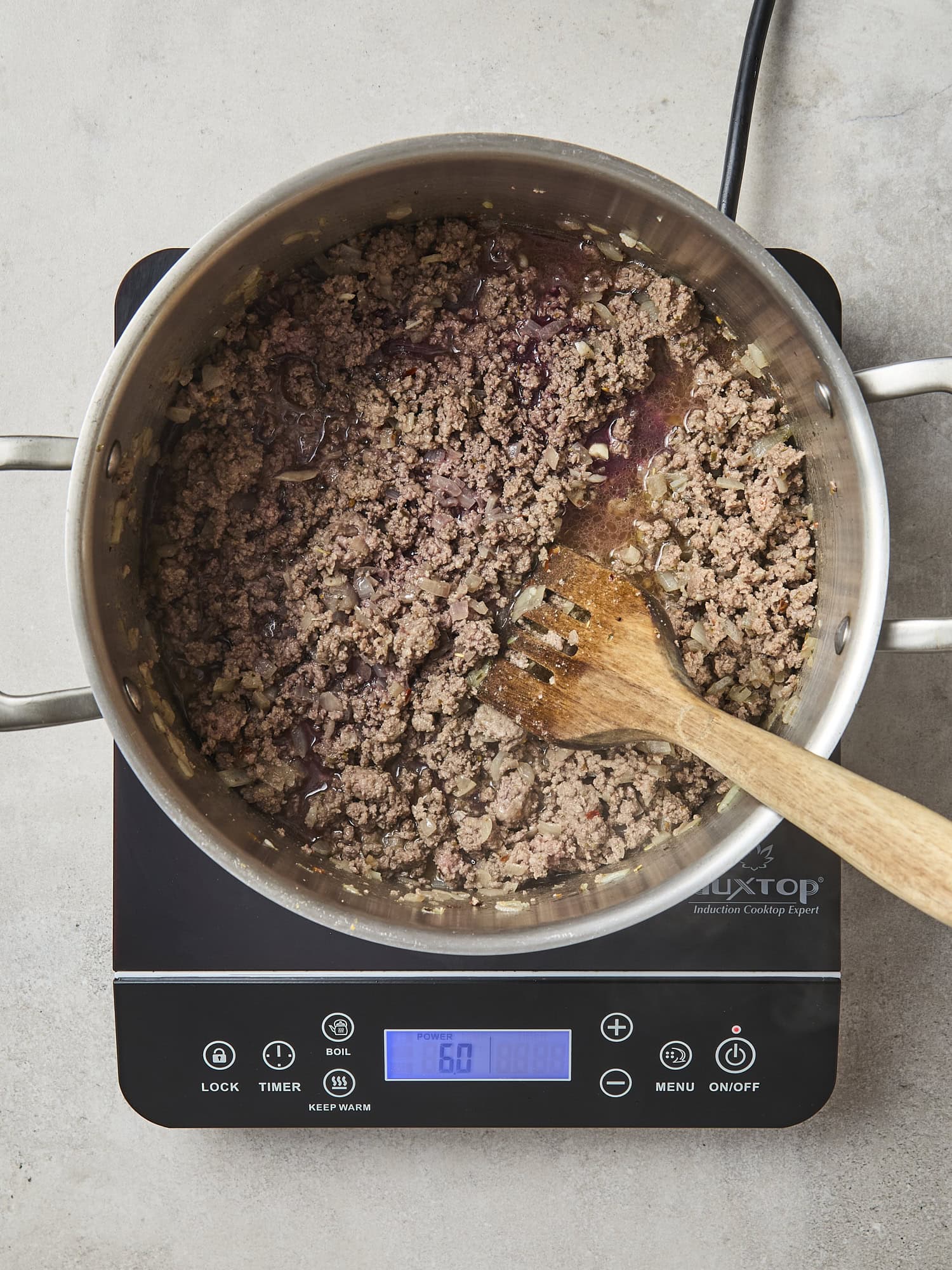 Browned beef for a lasagna recipe.