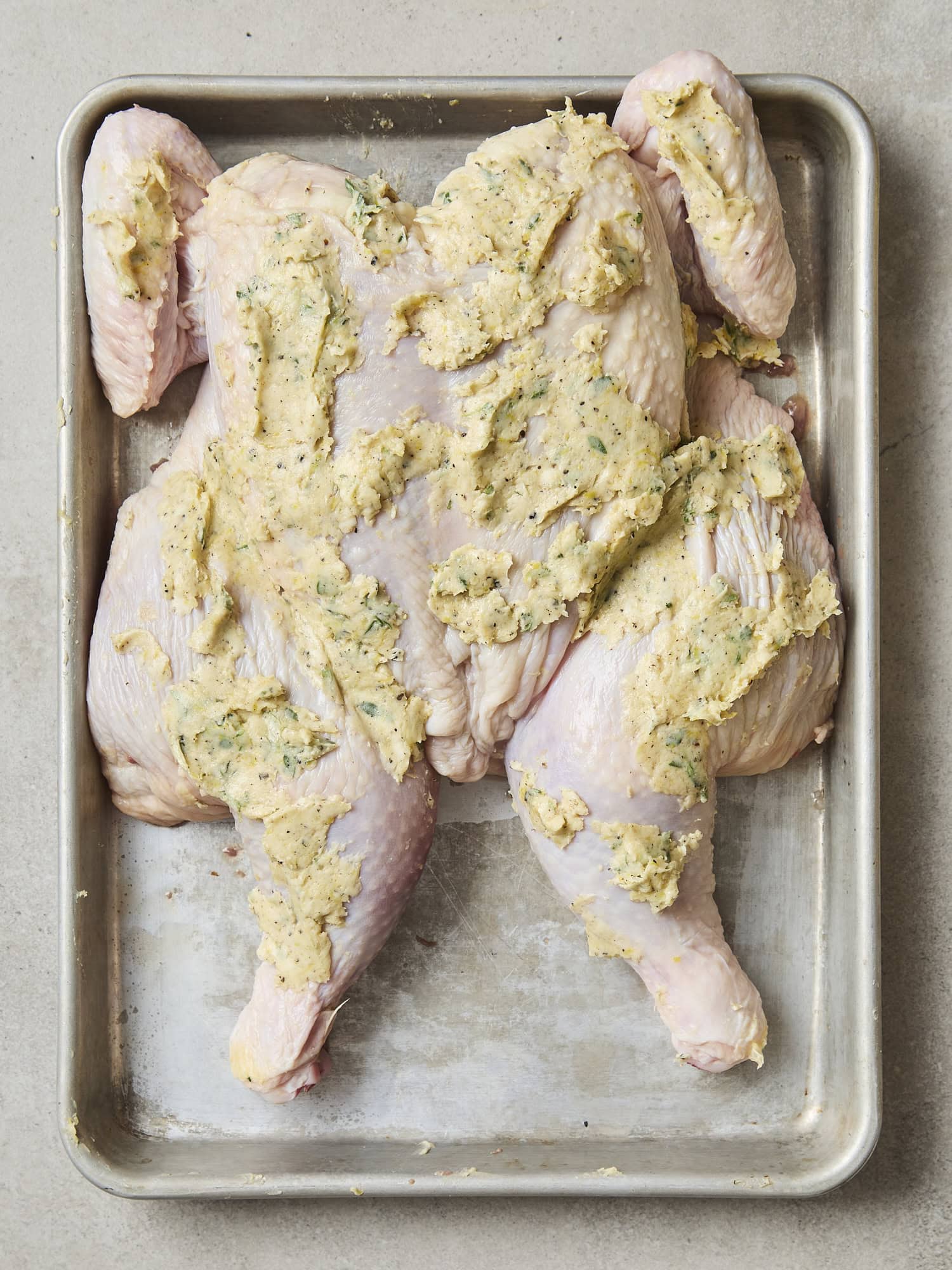 Spatchcocked chicken with butter rub all over.