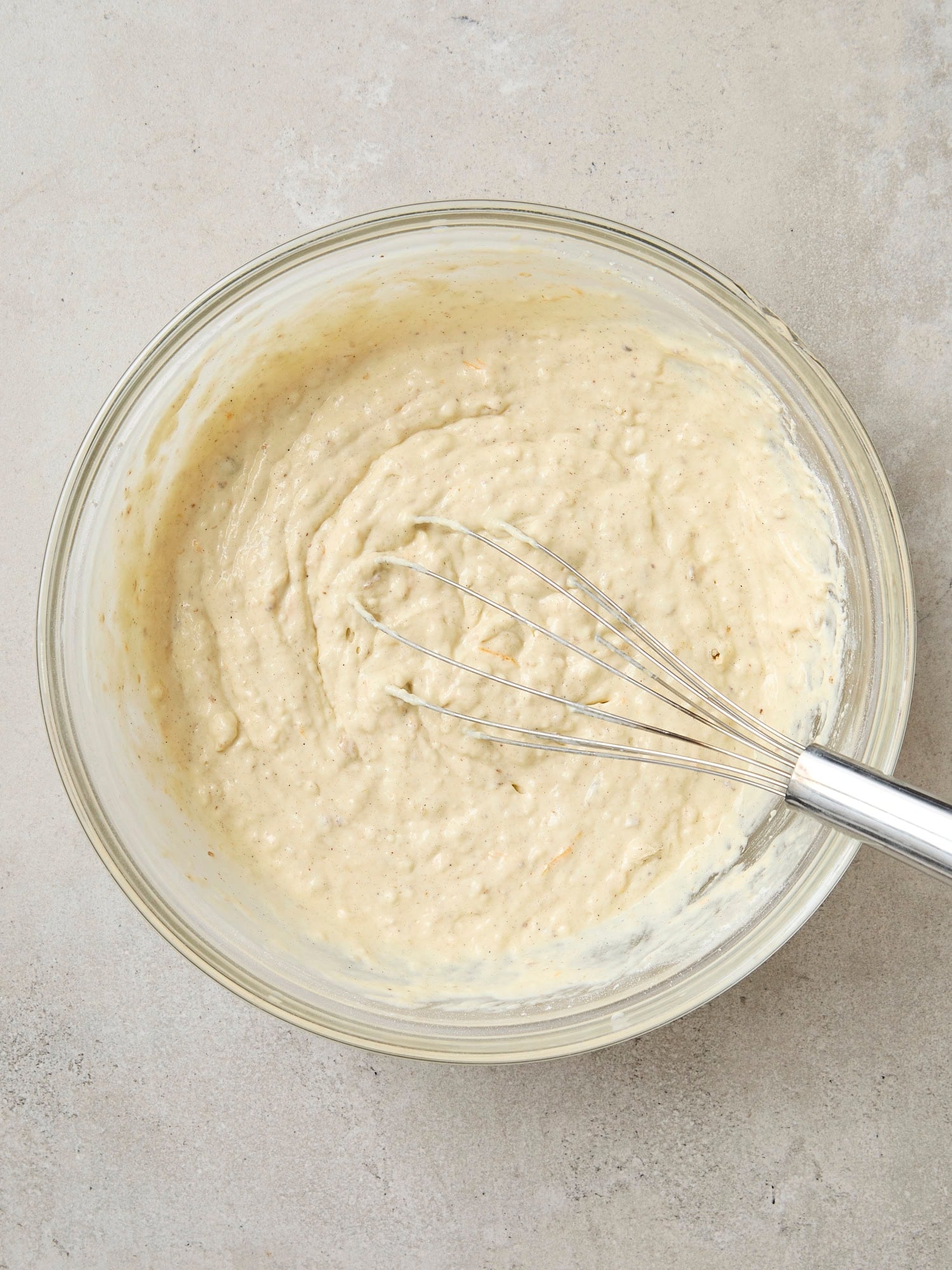 Buttermilk pancake batter in glass bowl.