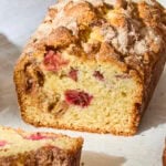Rhubarb buttermilk cake with pieces of rhubarb in loaf.