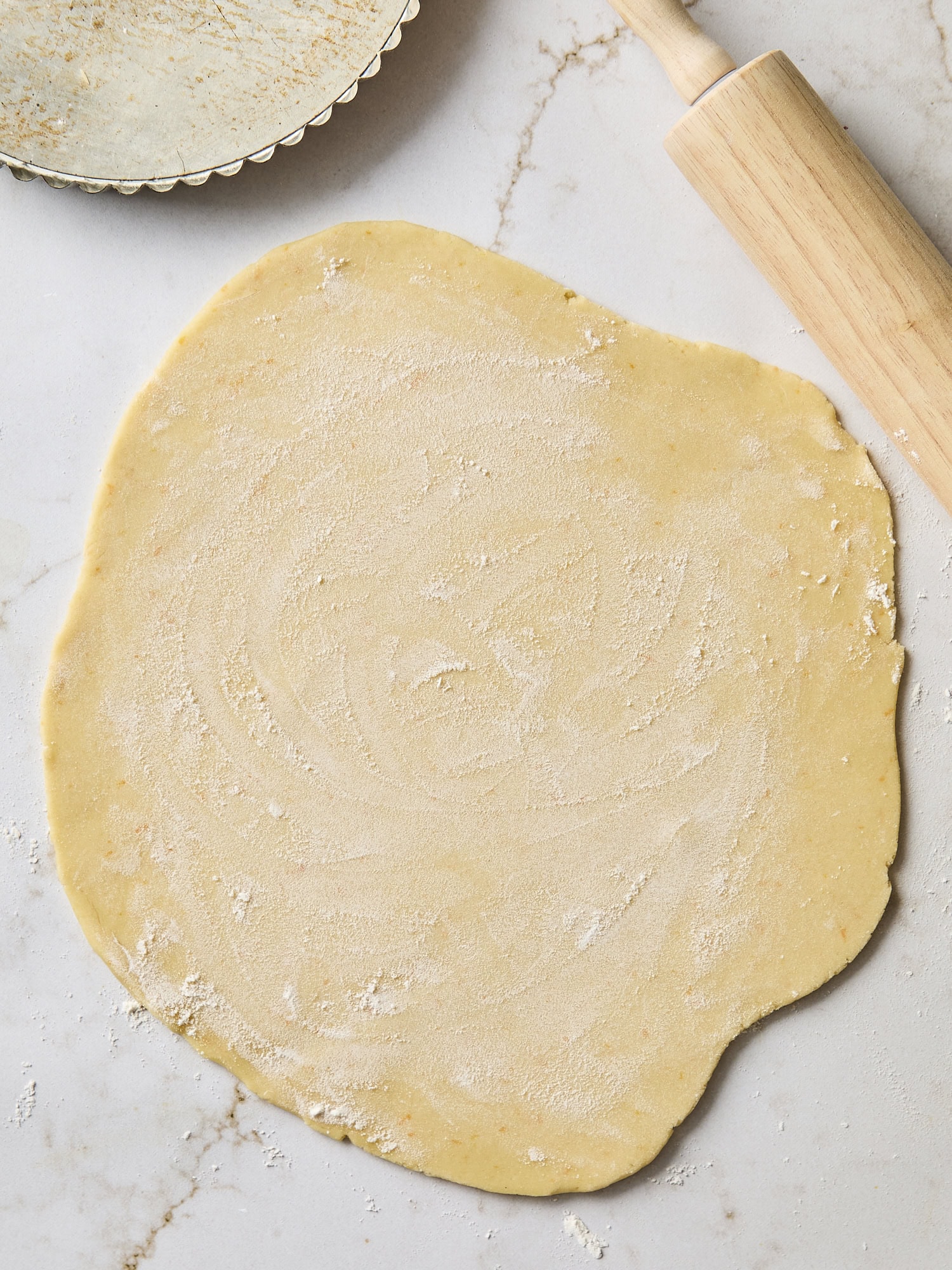 Rolled out pie dough.