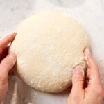 Pizza dough in ball form before being pressed out.