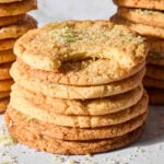 Lime sugar cookies with bite taken out.
