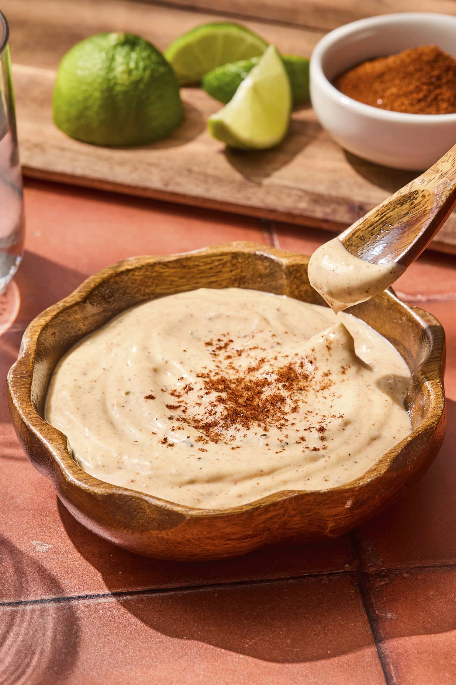 Spoon holding chipotle mayo showing texture.