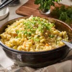 Classic macaroni salad served with scallion on top.