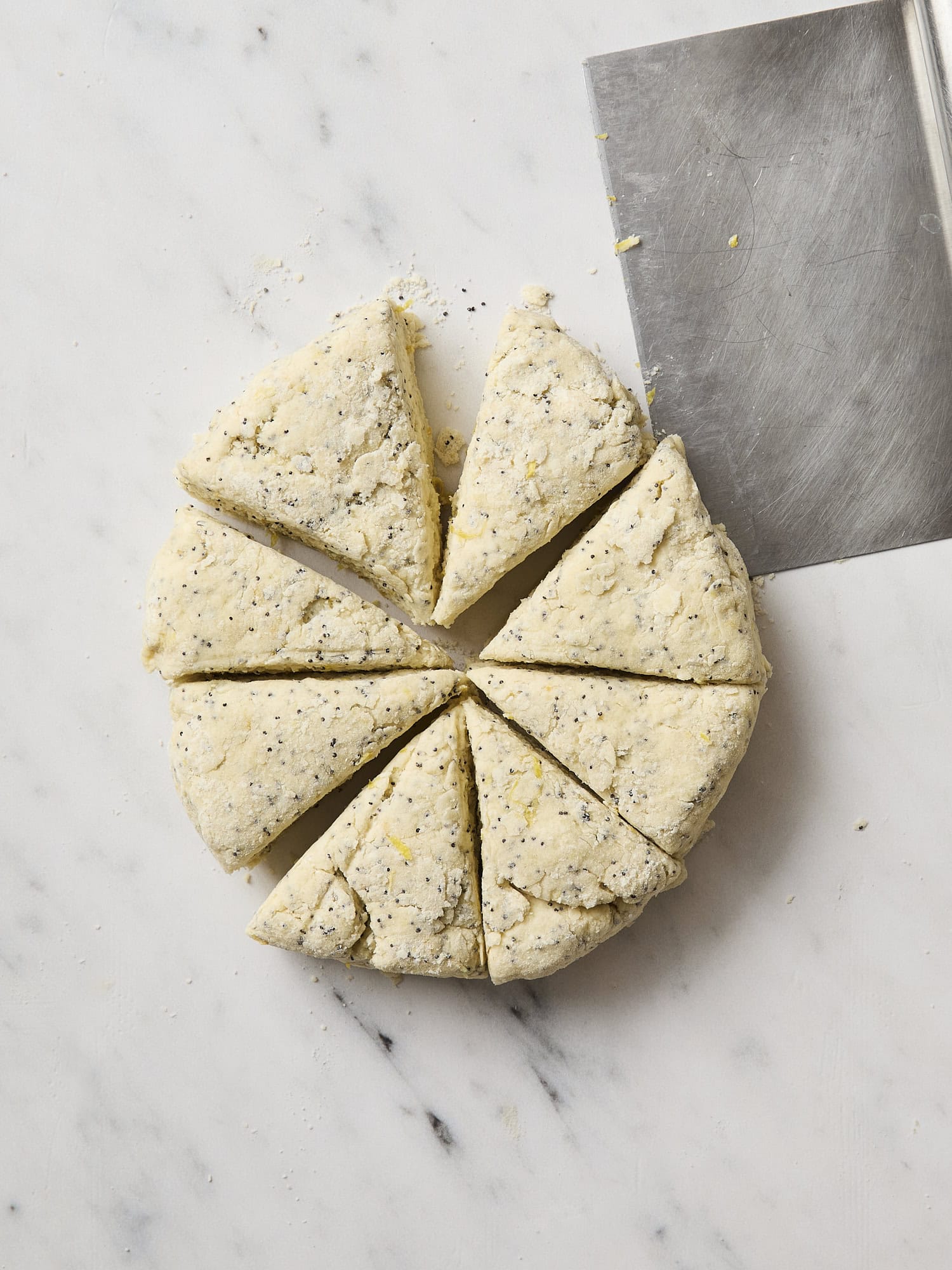 Scone dough cut into 8 triangles.