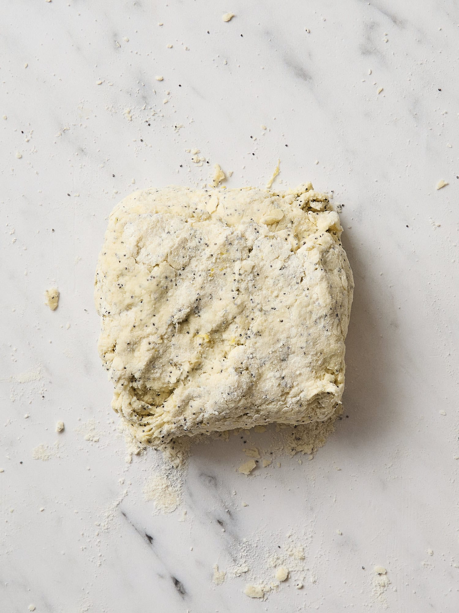 Pressed dough for poppy seed scones.