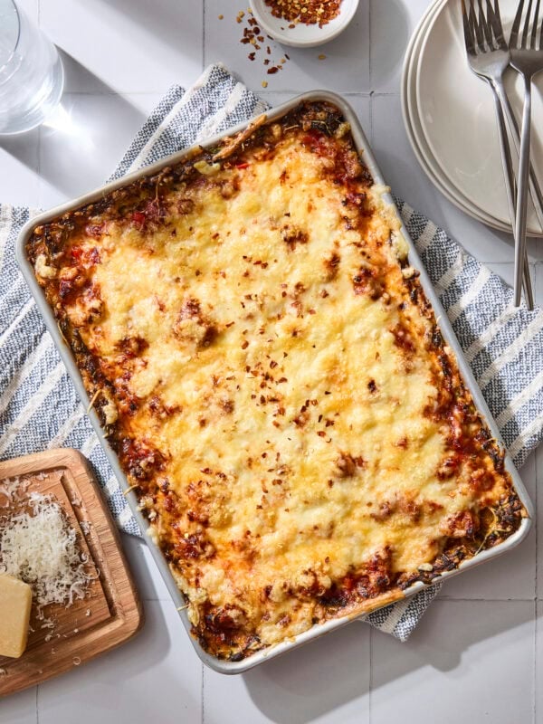 Baked zucchini pizza casserole in a sheet pan.
