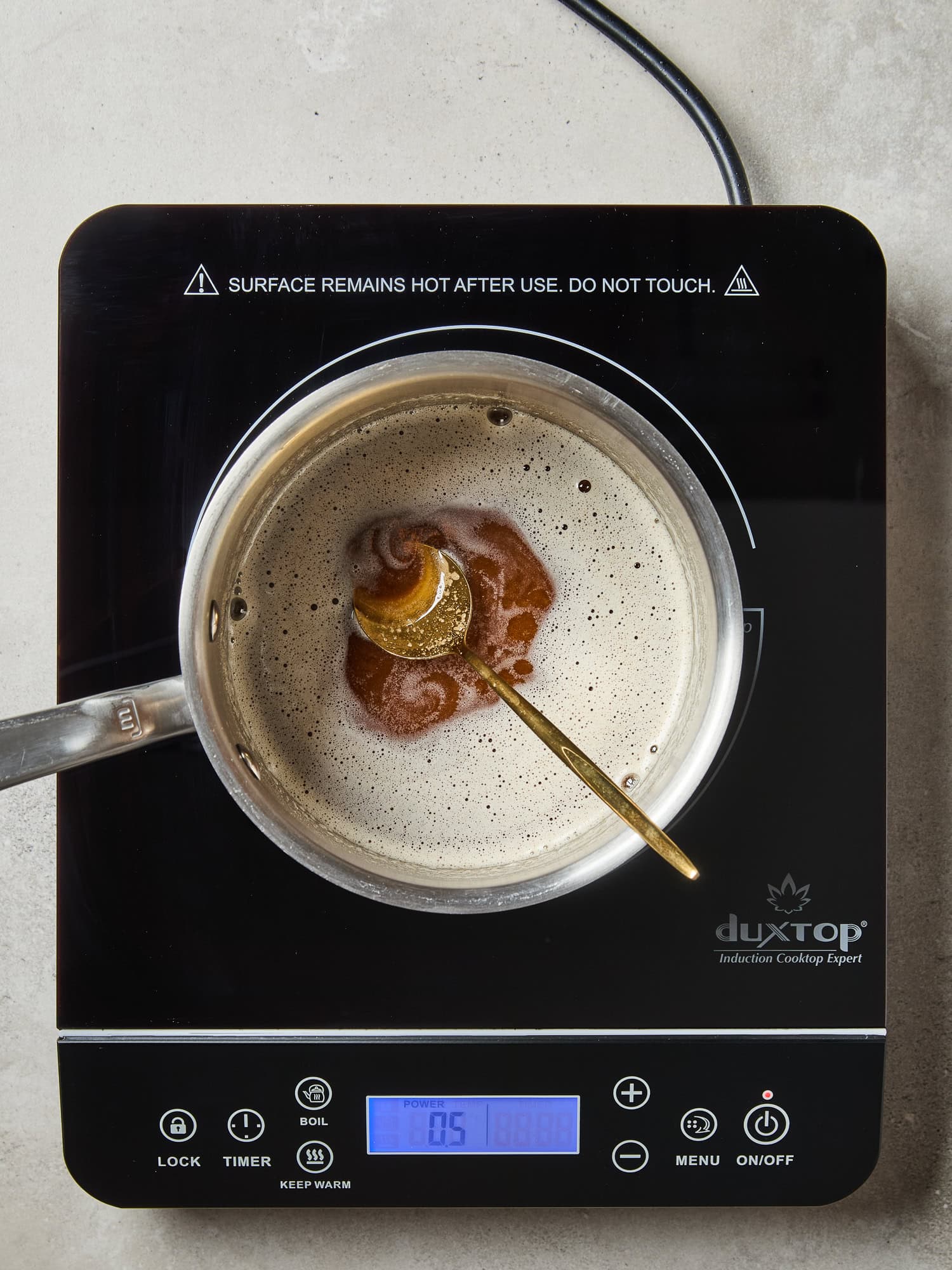Browning butter for a banana bread over heat.