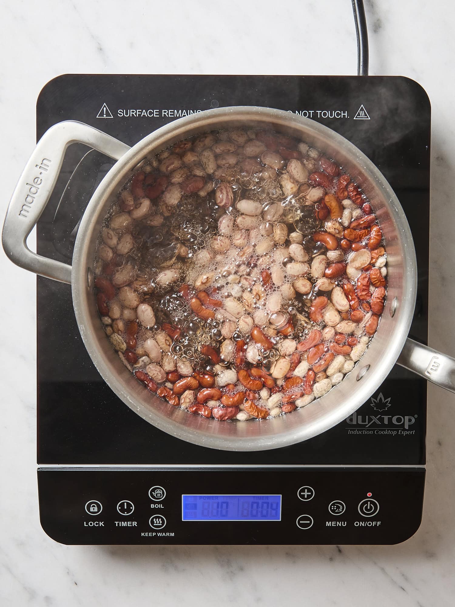 Stockpot with mixture of dried beans for chili.