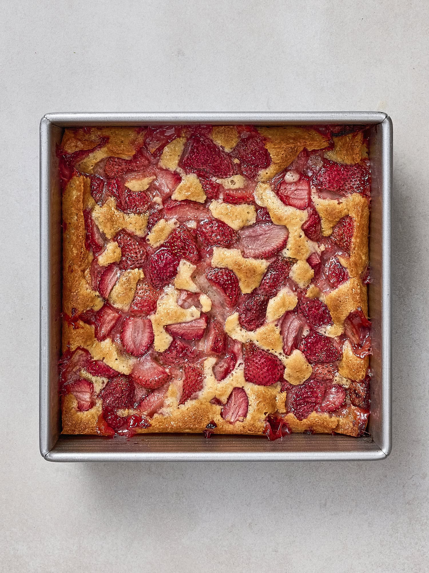 Baked strawberry cobbler after coming out of the oven.