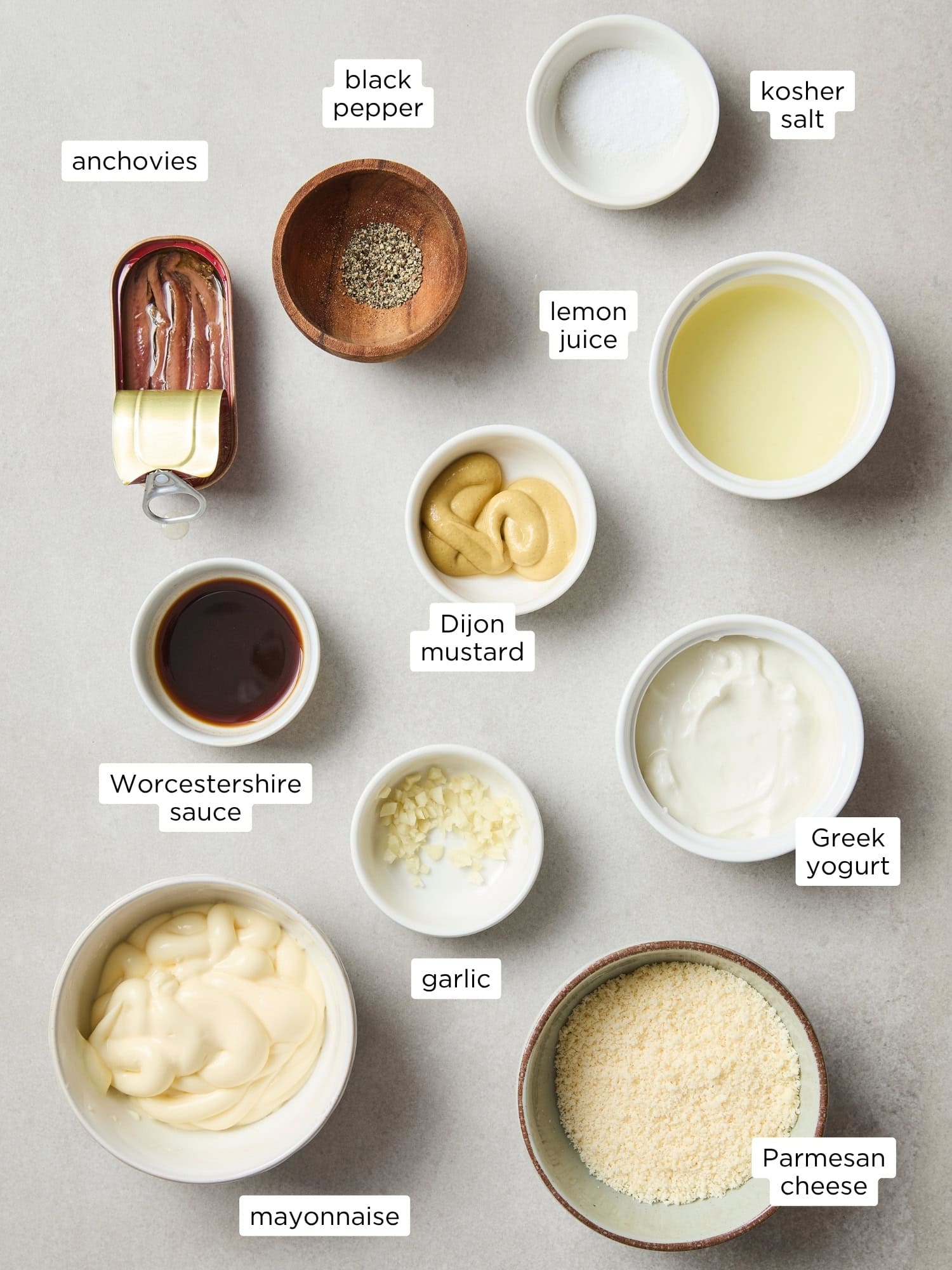 All ingredients needed for homemade Caesar dressing.