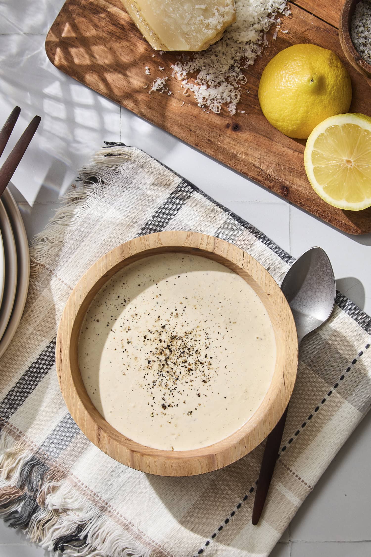 Wooden bowl with homemade easy Caesar dressing.