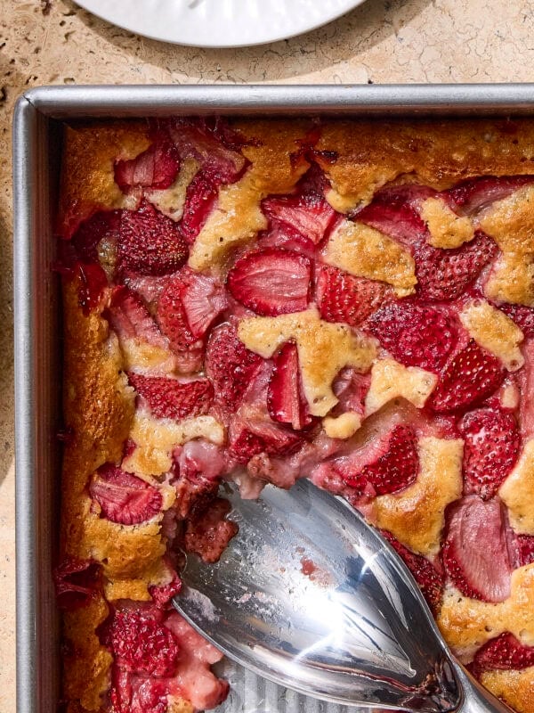 Baking pan with baked strawberry cobbler recipe.