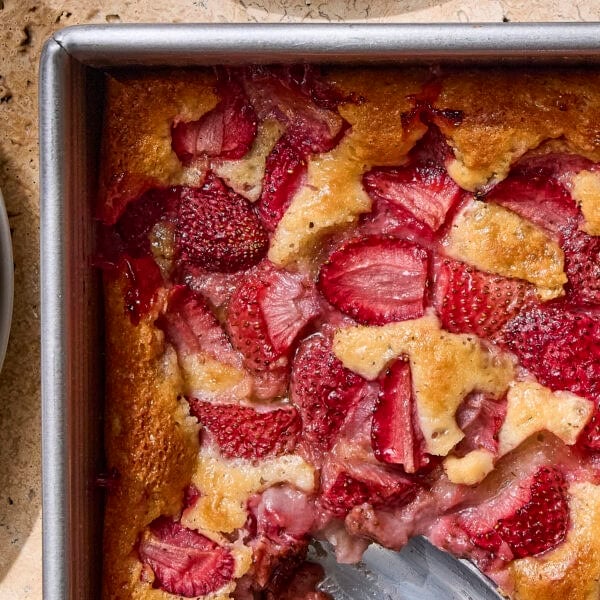 Strawberry cobbler recipe in baking dish.
