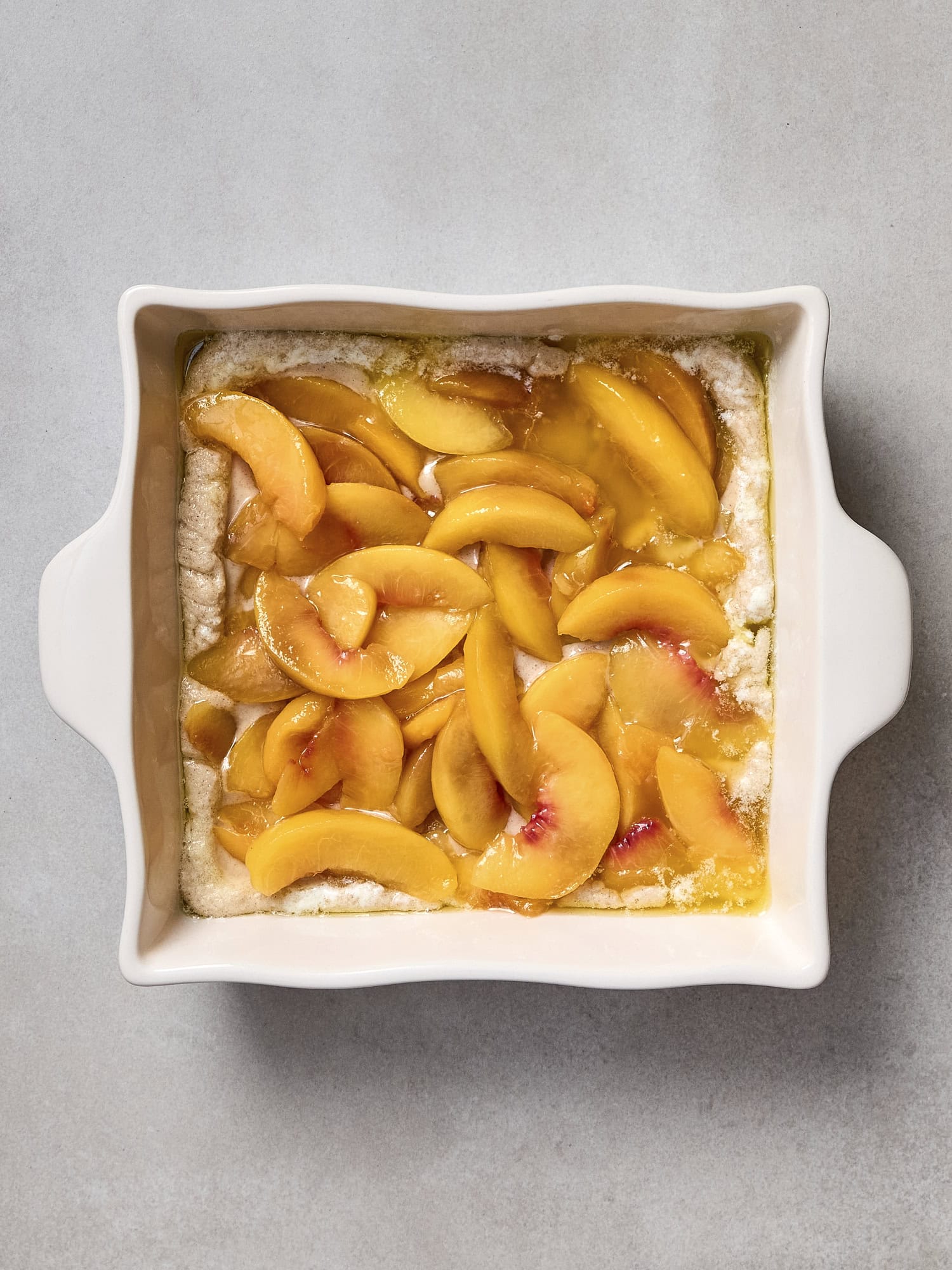 Unbaked peach cobbler.
