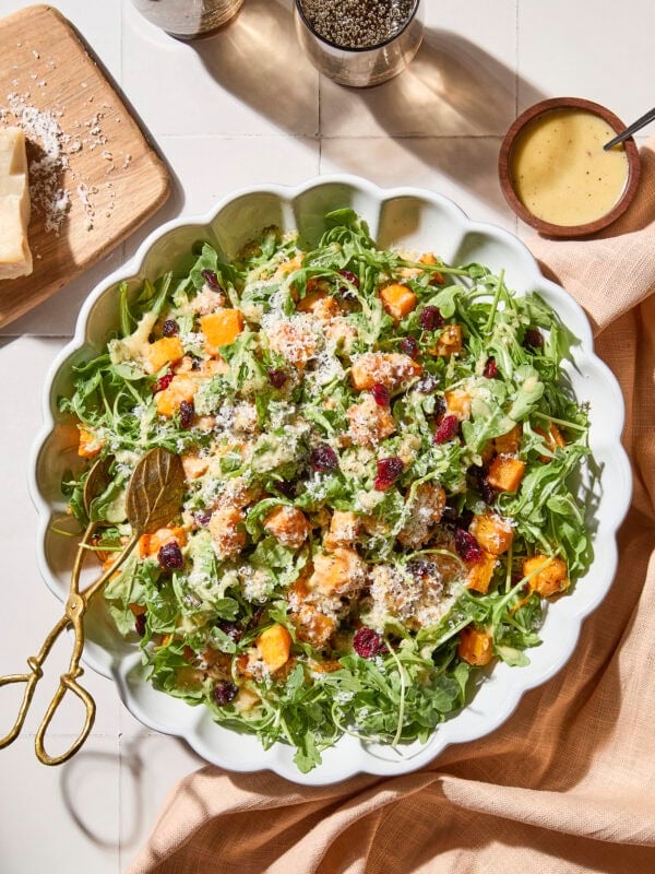 Large salad bowl with roasted butternut squash with apple cider vinaigrette.